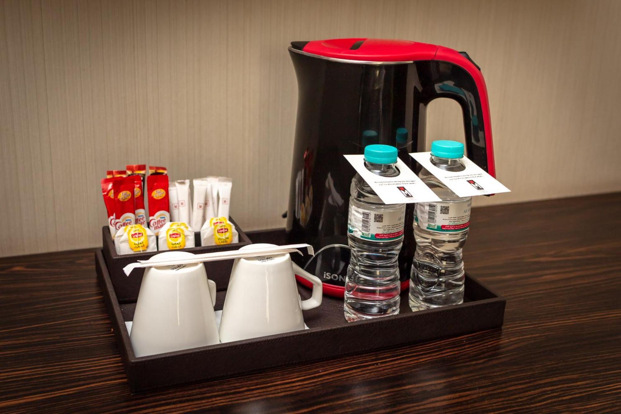 M Hotel Makkah By Millennium Mecca Exterior foto A tray of room service